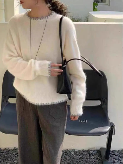Women's crew-neck long-sleeve gray knit sweater with decorative trim