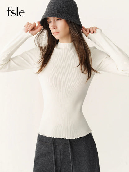Women's ribbed long-sleeve top with stand collar and ruffled hem