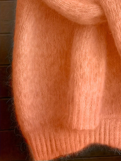 Women's coral sweater with crew neckline