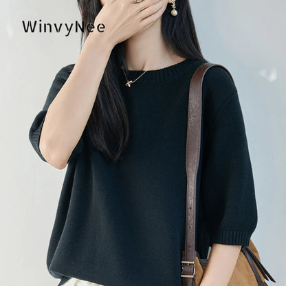 Women's short-sleeve crew-neck knit sweater with ribbed cuffs