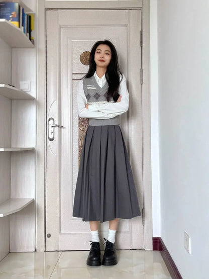 Women's gray midi pleated skirt with argyle knitted vest and shirt set