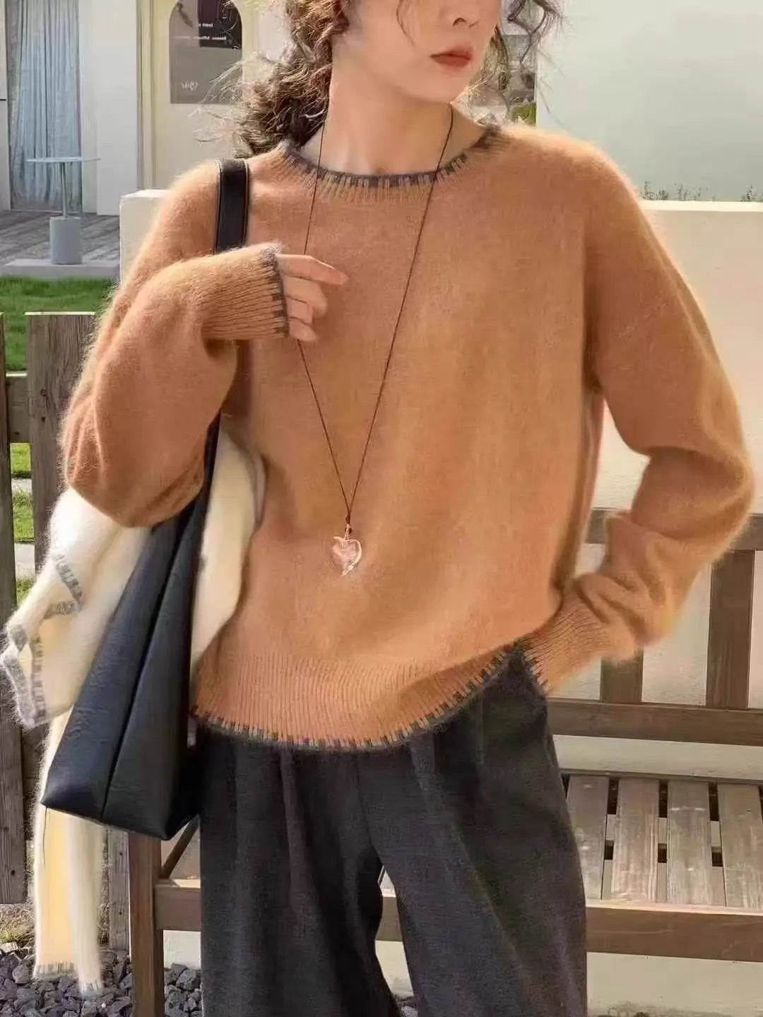 Women's crew-neck long-sleeve gray knit sweater with decorative trim