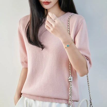 Women's short-sleeve crew-neck knit sweater with ribbed cuffs
