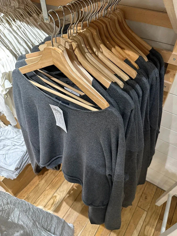 Women's cropped crew-neck long-sleeve pullover with raw edges