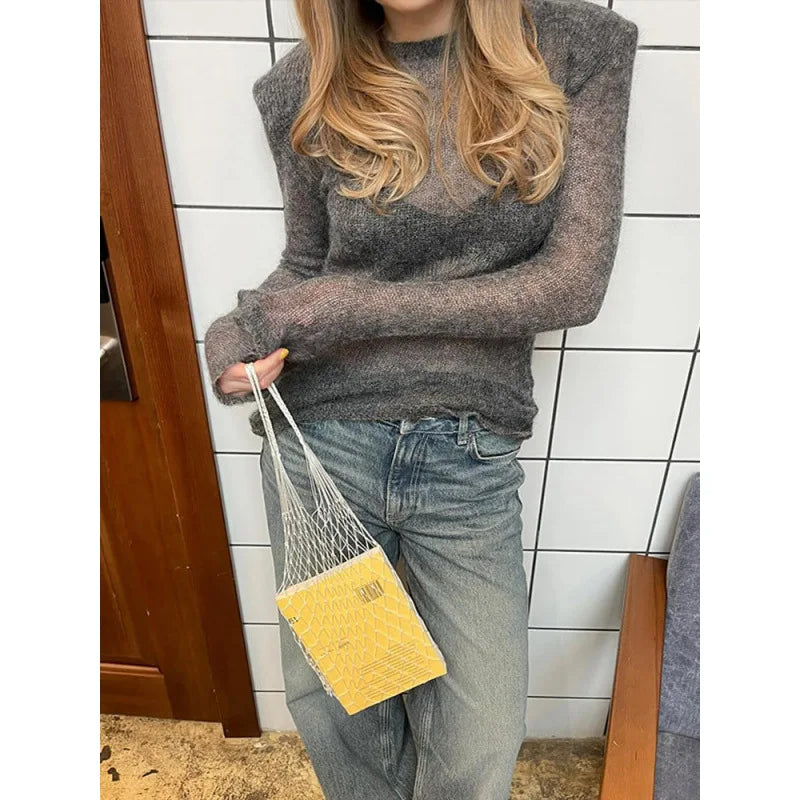 Women's long-sleeve sweater with sheer look, crew neck, and soft material