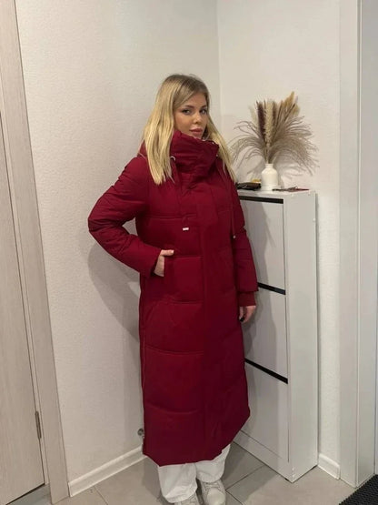 Long quilted coat with hood in red-burgundy
