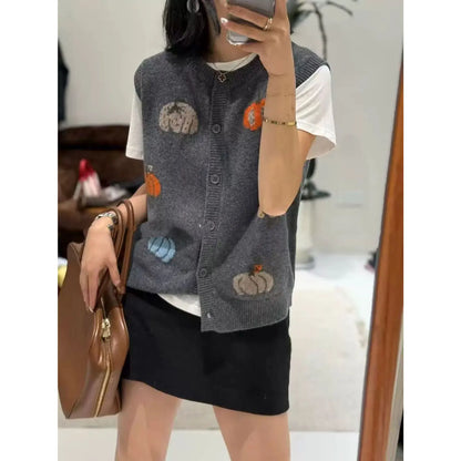Women's knitted vest with pumpkin motifs, button placket, and round neckline