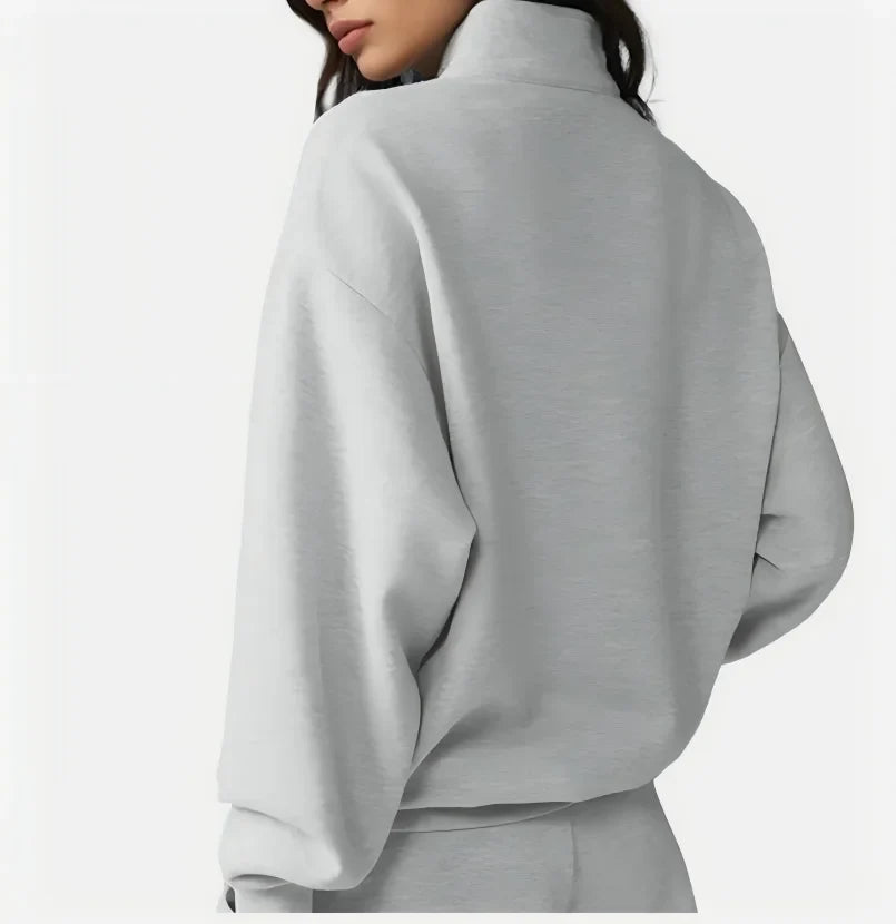 Two-piece loungewear set with stand collar and shorts, light gray
