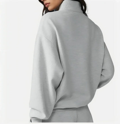 Two-piece loungewear set with stand collar and shorts, light gray