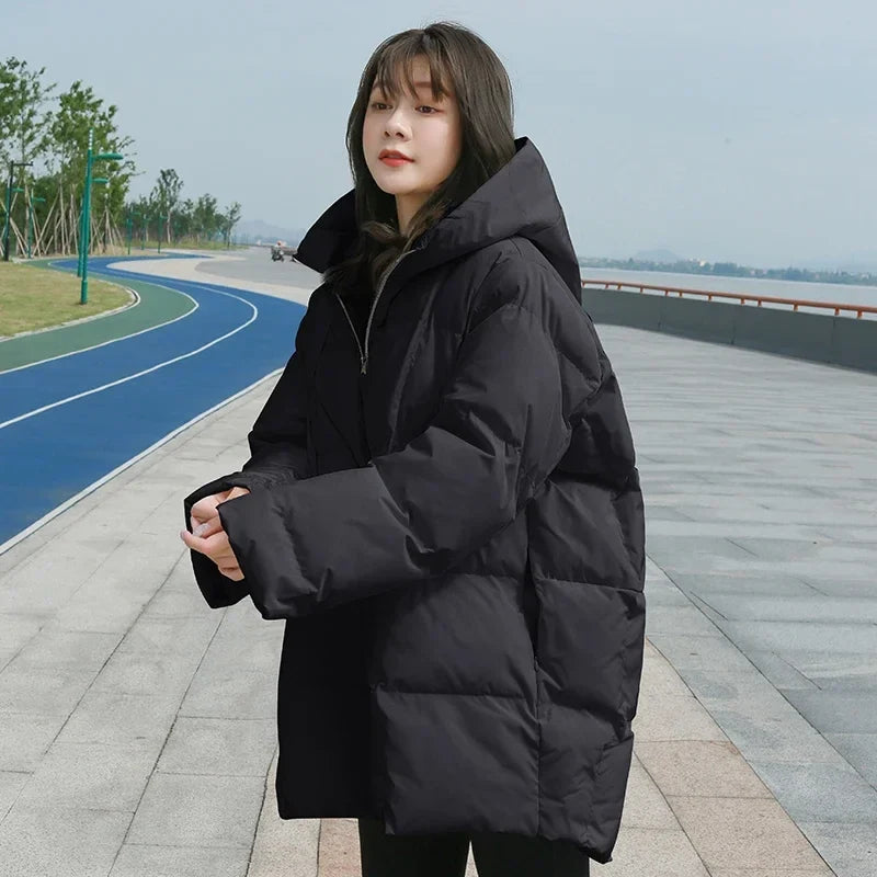 Damen Steppjacke mit Kapuze Oversize Design Winterjacke