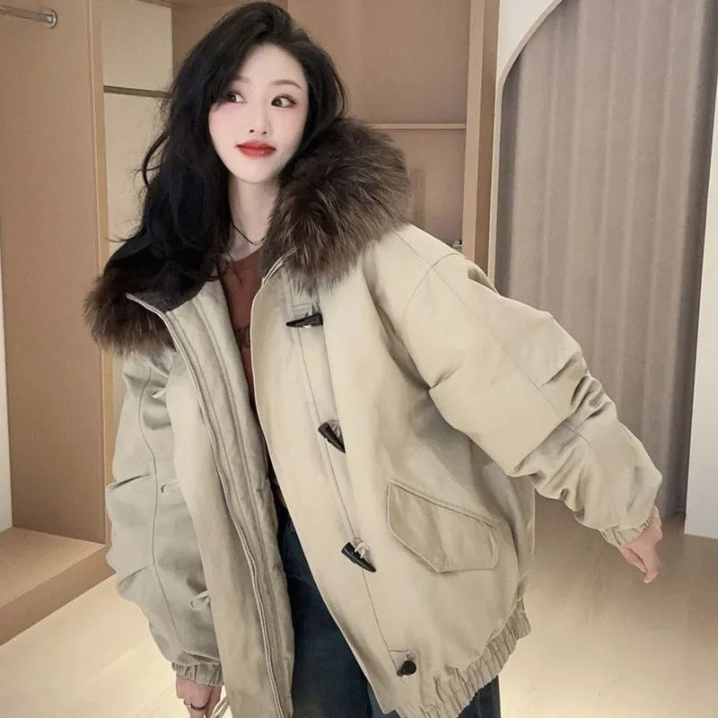 Women's quilted jacket with faux fur hood & toggle buttons