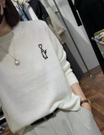 Women's crew-neck long-sleeve fine-knit sweater with embroidered motif