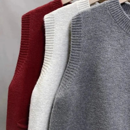 Women's knitted vest with crew neck, button placket, and pockets