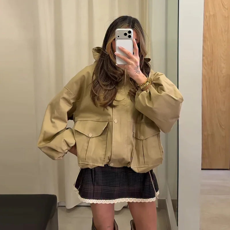 Short women's parka jacket with hood, wide sleeves and drawstring