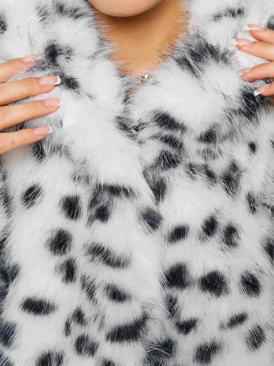 Women's faux-fur hooded jacket with a black-and-white spotted pattern