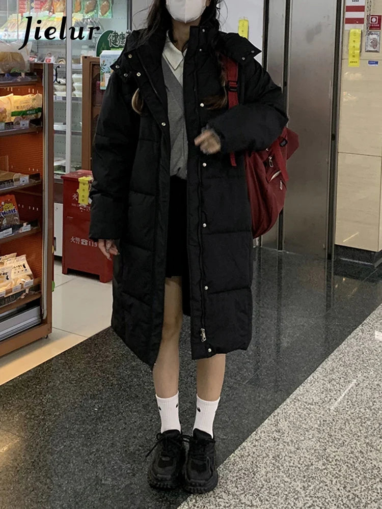 Women's long quilted coat with hood, solid colors