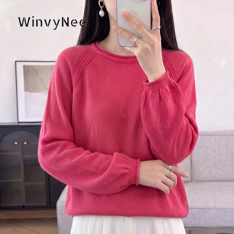 Women's crew-neck long-sleeve knit sweater with raglan sleeves and cuffs