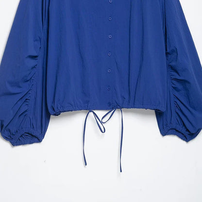 Blue women's blouse with stand-up collar and drawstring hem