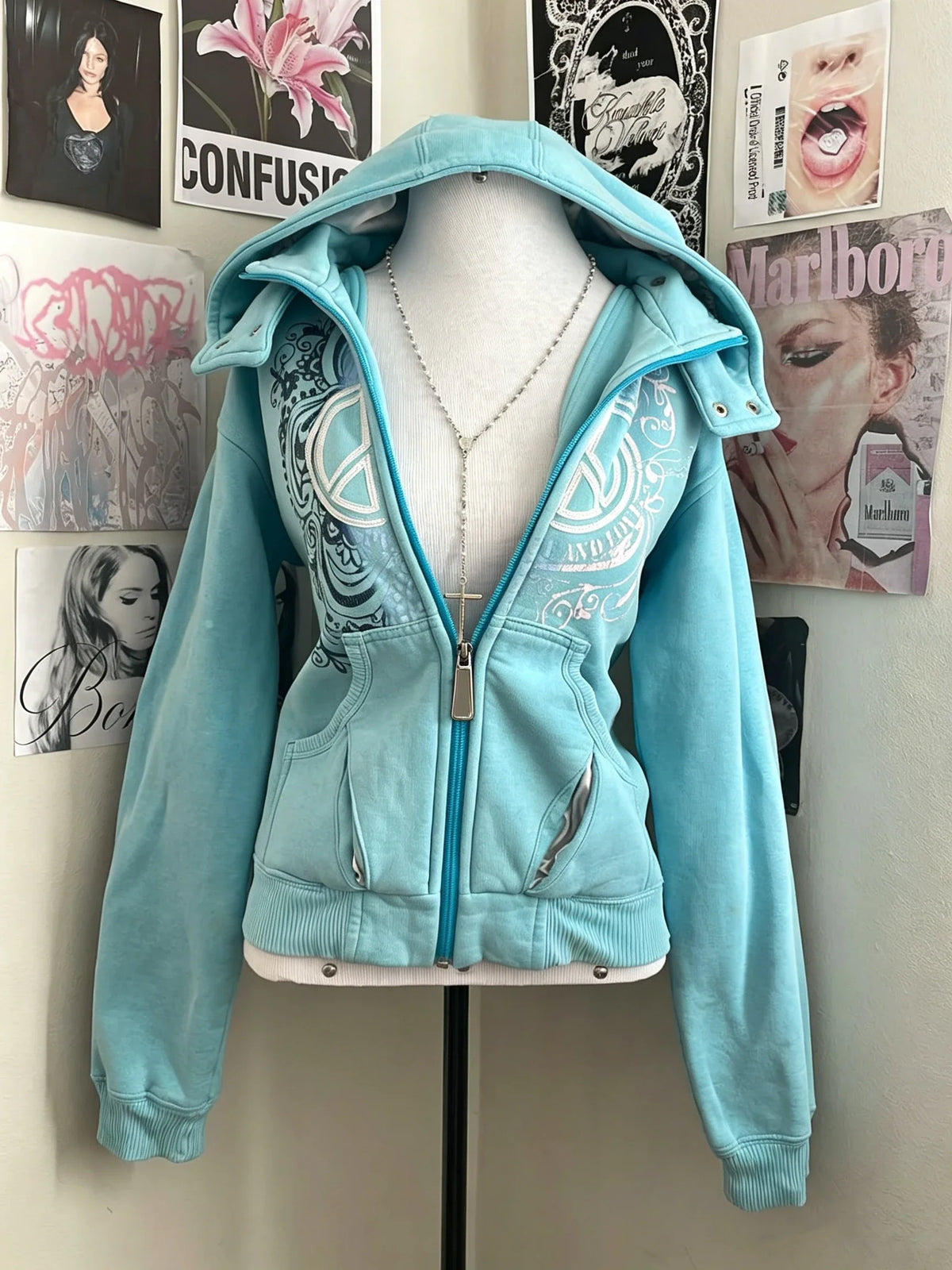 Women's turquoise hoodie with zipper and graphic print
