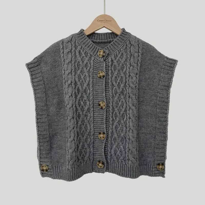 Women's cropped sleeveless cardigan with cable knit pattern, crew neck, and button placket