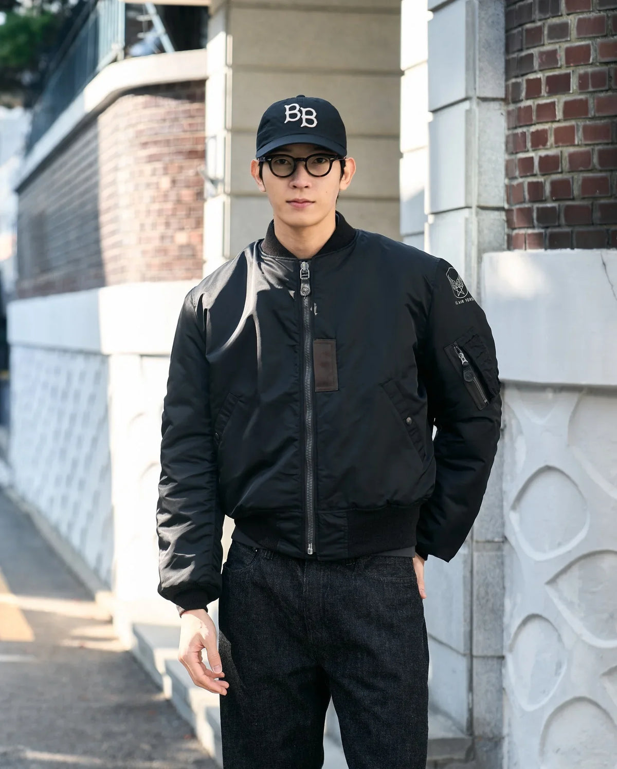 Unisex bomber jacket with zipper and sleeve pocket