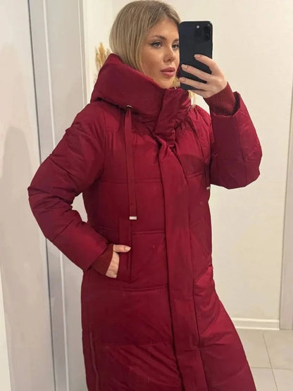 Long quilted coat with hood in red-burgundy