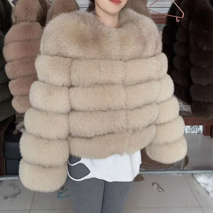 Women's faux fur jacket with voluminous sleeves and high collar