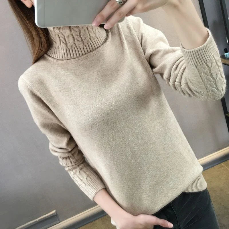 Women's turtleneck knitted sweater with cable-knit sleeves