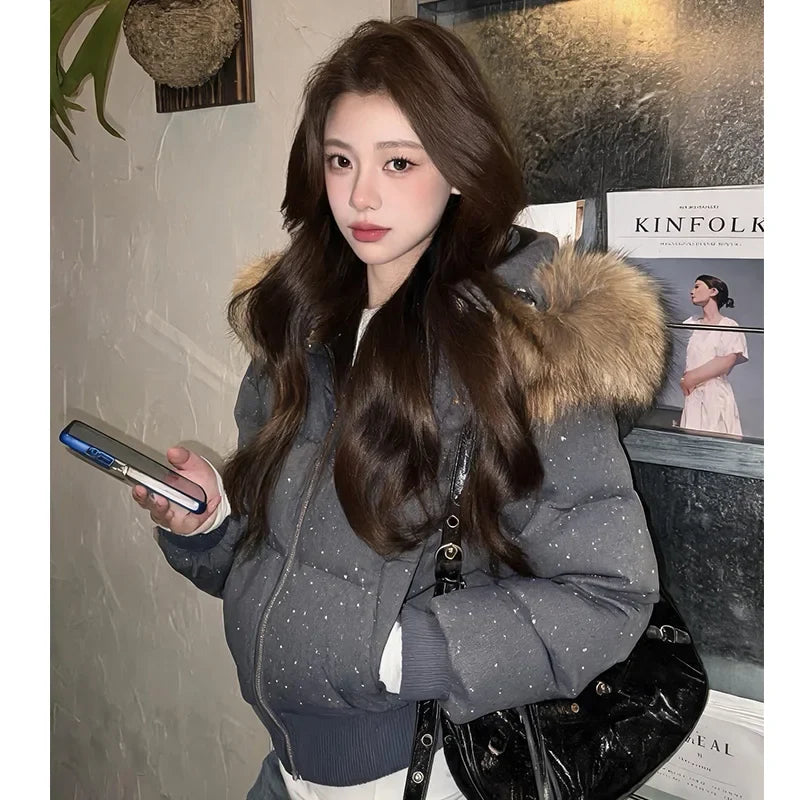 Women's quilted jacket with faux-fur hood and glitter details