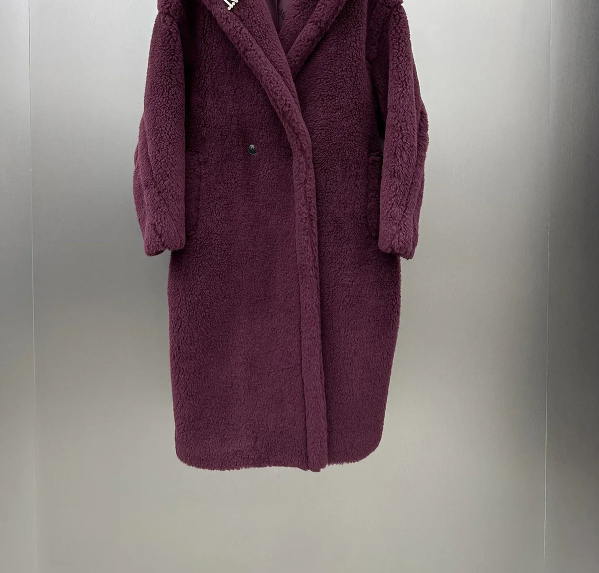 Women's long teddy coat with hood & teddy brooch