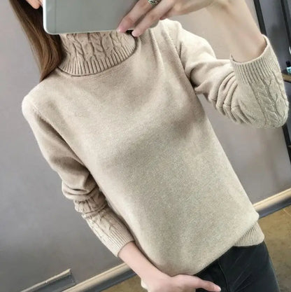 Women's turtleneck knitted sweater with cable-knit sleeves