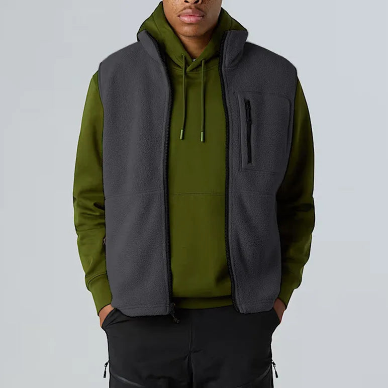 Unisex fleece vest with stand-up collar, zipper, and chest pocket