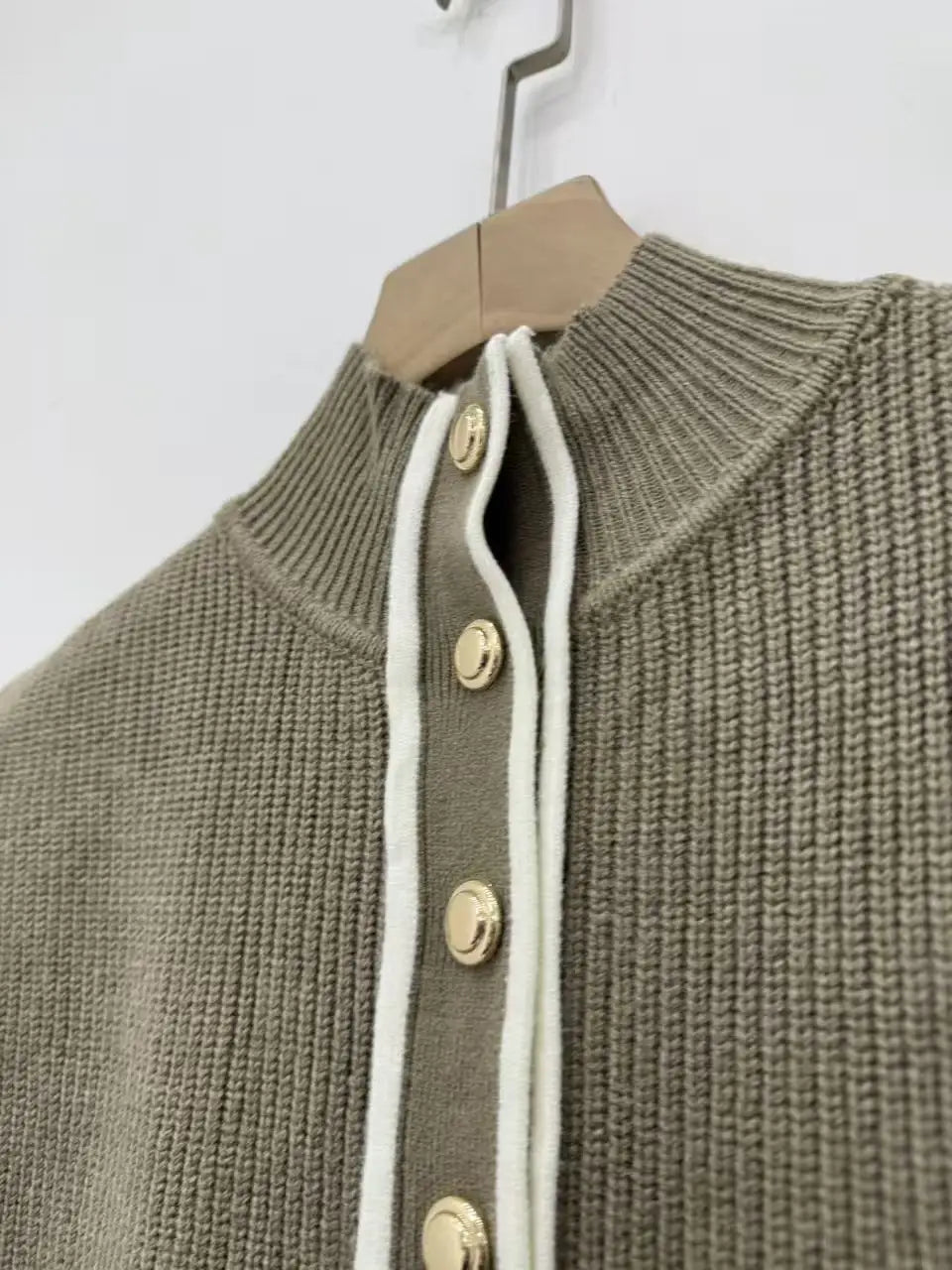 Women's ribbed olive green knitted vest with stand-up collar and decorative buttons