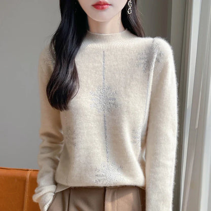 Women's sweater with stand-up collar and glitter snowflake pattern