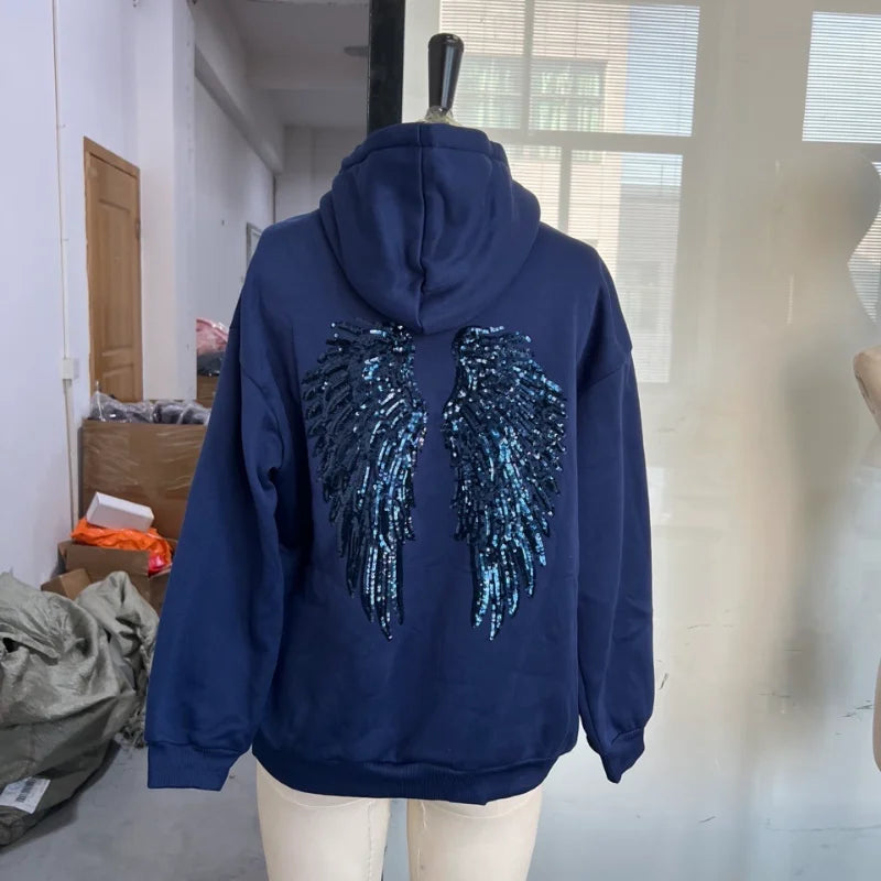 Long-sleeved hoodie with sequin wing motif on the back