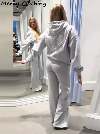 Long-sleeved hoodie with sequin wing motif on the back