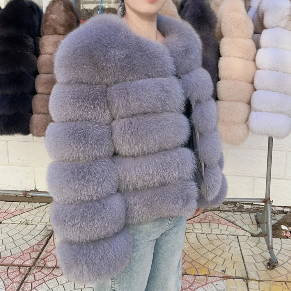 Women's faux fur jacket with voluminous sleeves and high collar