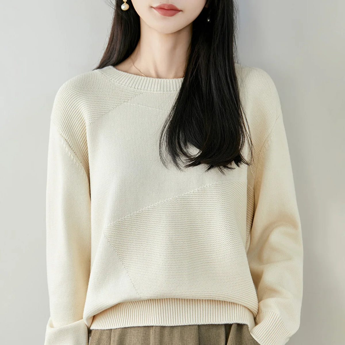 Women's crew-neck long-sleeve knit sweater with textured details
