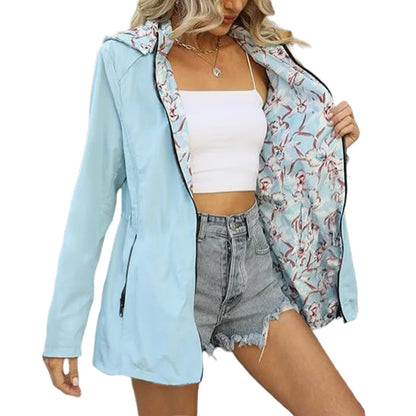 Reversible women's jacket with floral pattern, hood, and zipper, windbreaker