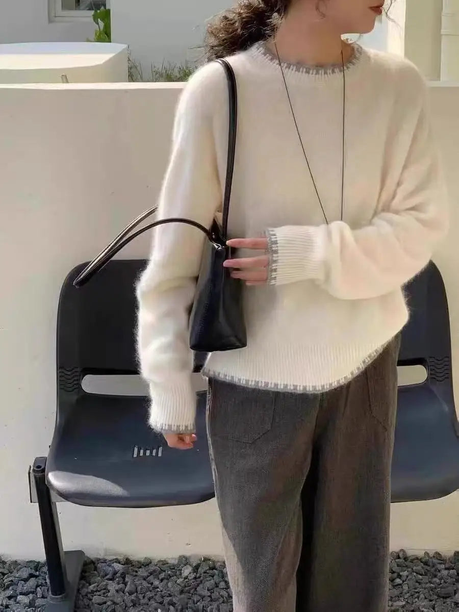 Women's crew-neck long-sleeve gray knit sweater with decorative trim