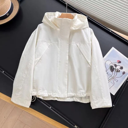 Short women's transitional jacket with hood and stand-up collar