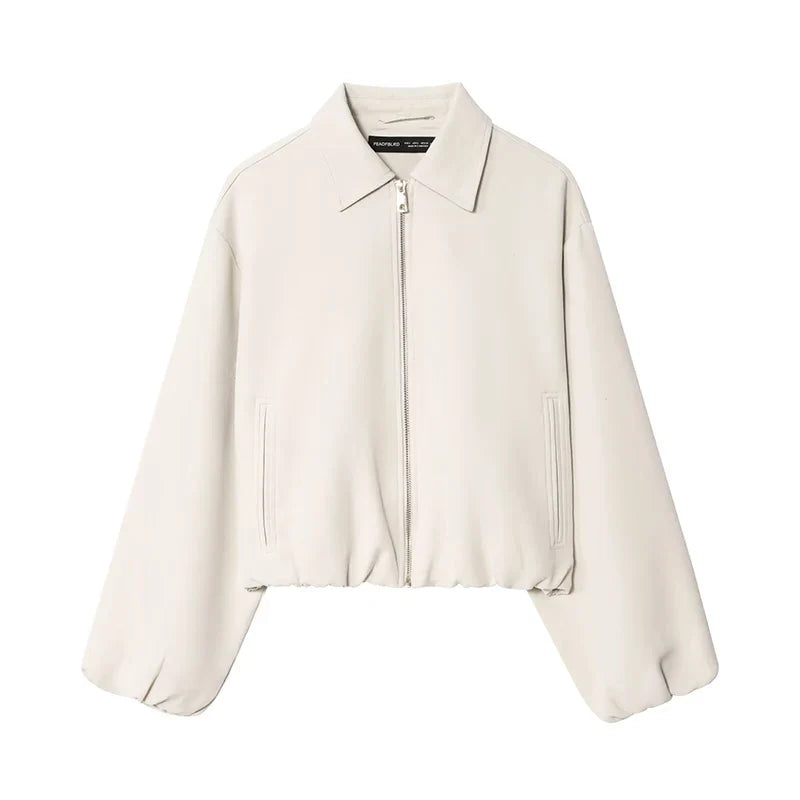 Short women's bomber jacket with collar, zipper, and long sleeves