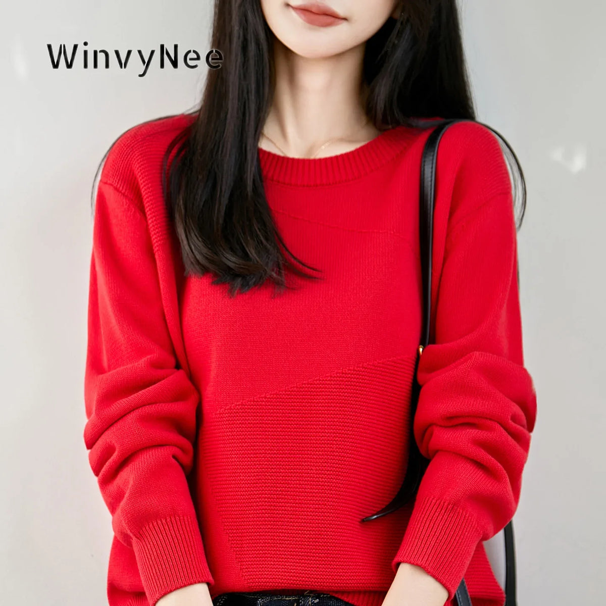 Women's crew-neck long-sleeve knit sweater with textured details