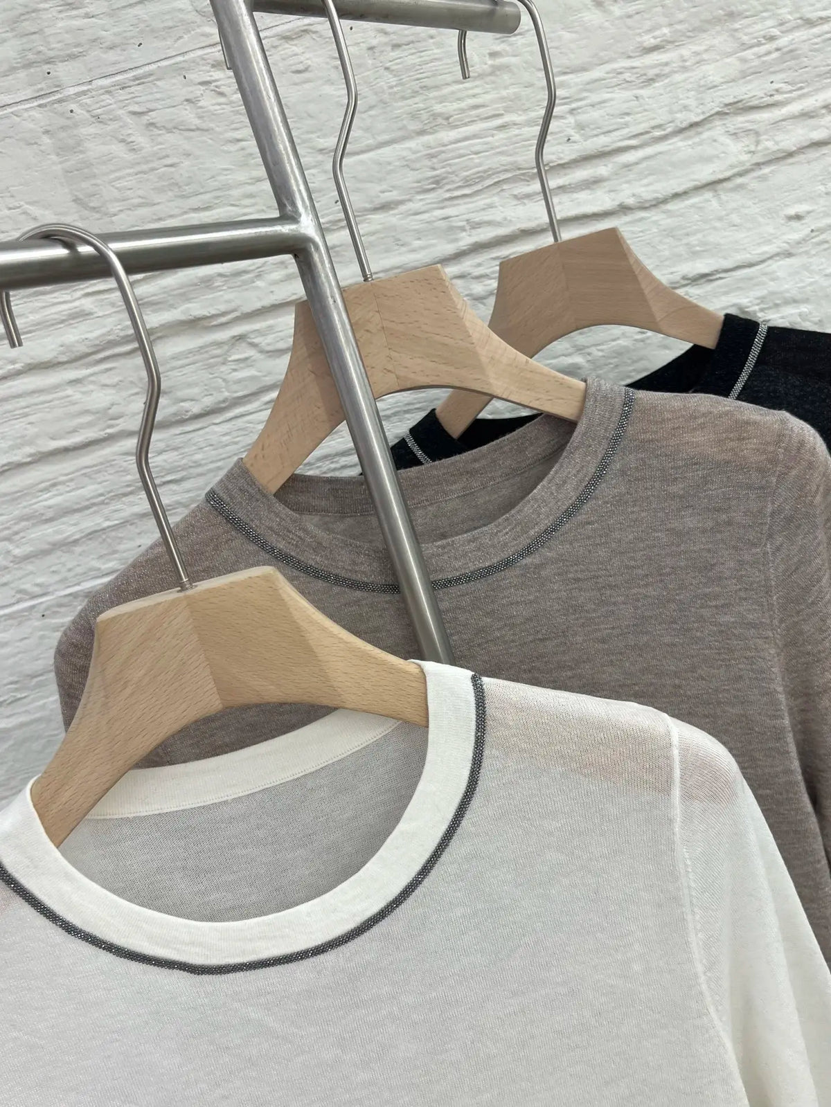 Crew-neck long-sleeve top with contrast stitching, slightly sheer fabric