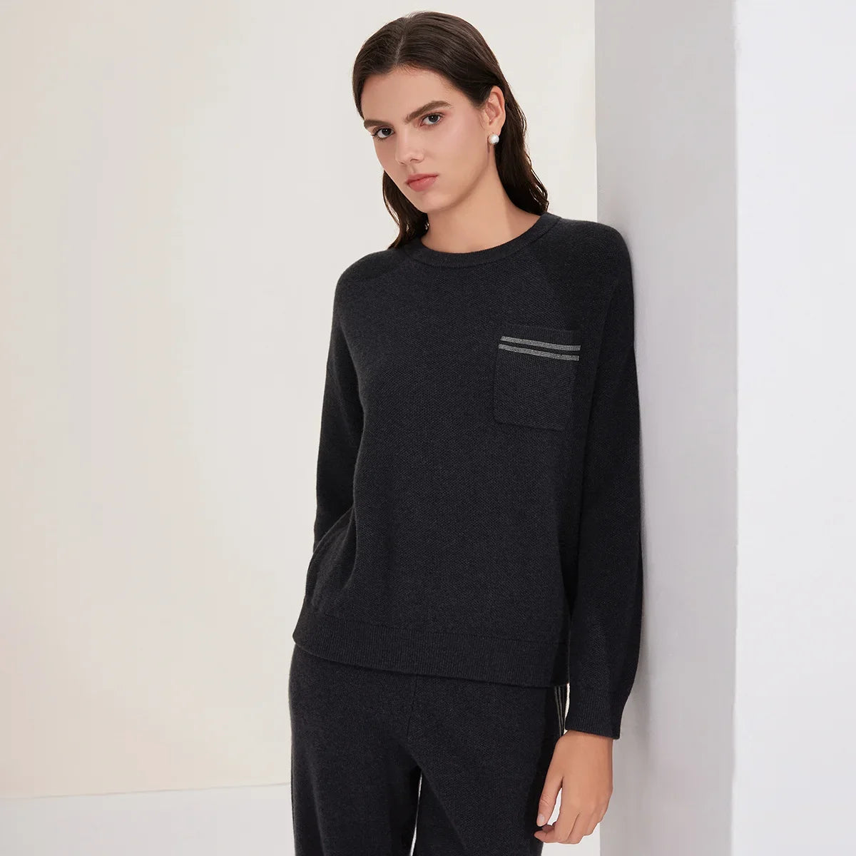 Women's crew-neck sweater with chest pocket and stripes