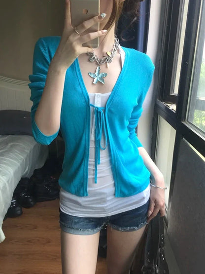 Women's rib-knit cardigan in turquoise with long sleeves and V-neck