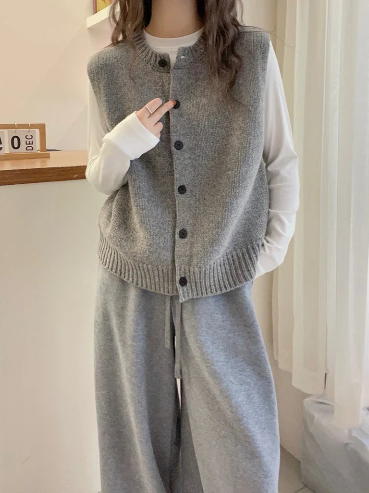 Women's knitted vest with button placket, round neckline, and rib-knit hem