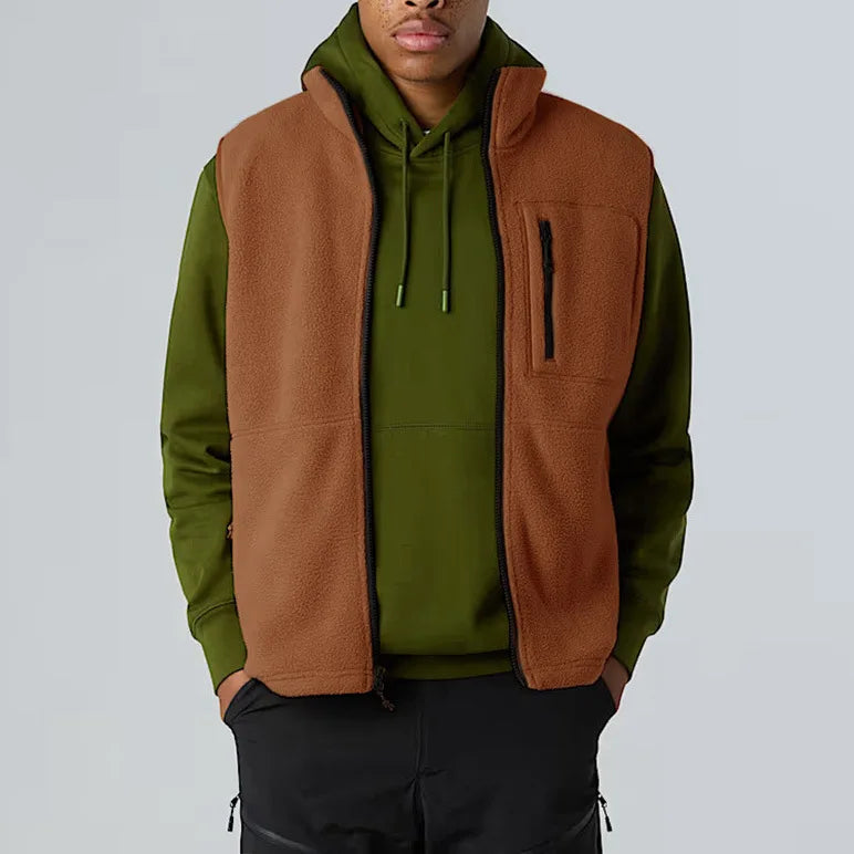 Unisex fleece vest with stand-up collar, zipper, and chest pocket
