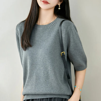 Women's short-sleeve crew-neck knit sweater with ribbed cuffs