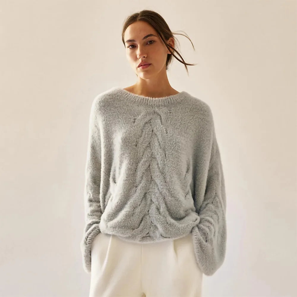Women's oversized knit sweater with cable pattern, crew neck, long sleeves, soft